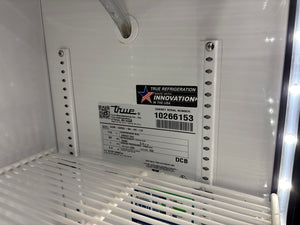 True GDM-33-SSL-56-HC-LD  Half Size Beverage Merchandiser w/ Sliding Doors (Floor Model)
