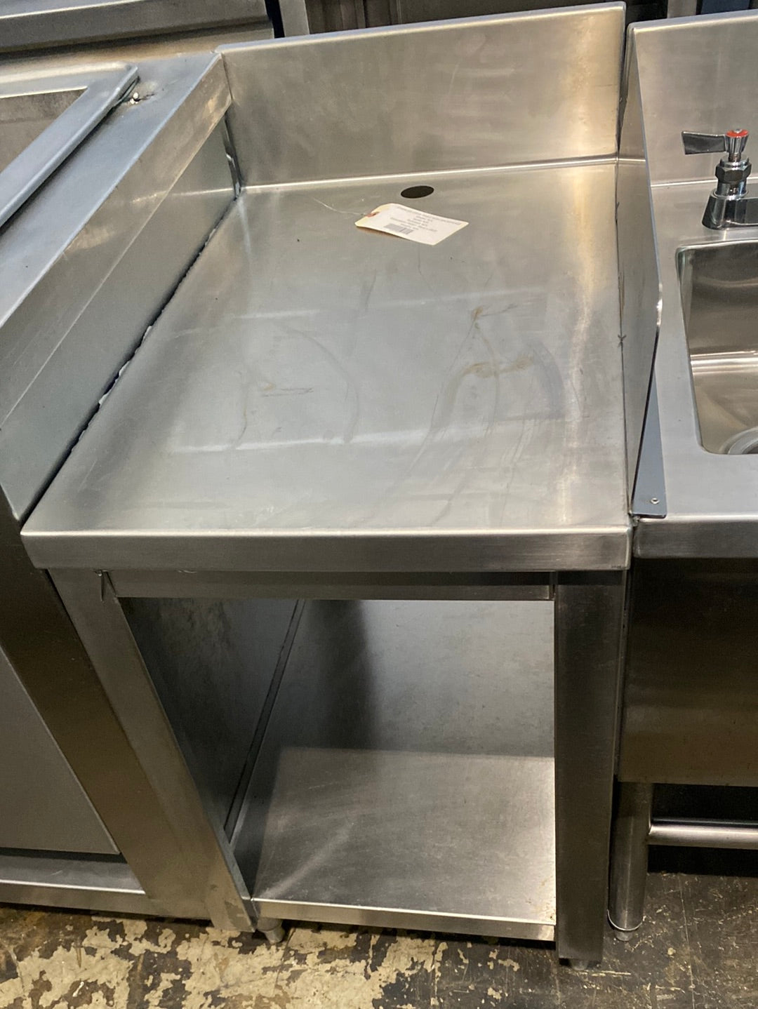 STAINLESS STEAL TABLE WITH BACKSPLASH - Maltese & Co